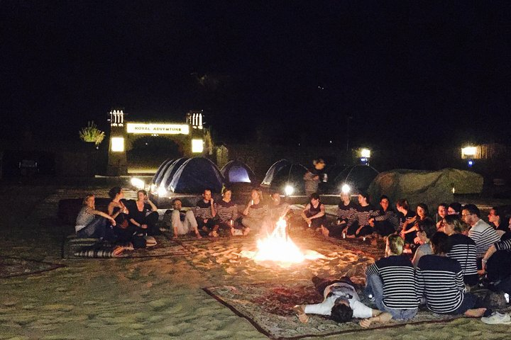 Gather around the warm glow of the campfire sharing stories and laughter under a starlit sky while experiencing the charm of traditional Bedouin life in the Dubai desert.